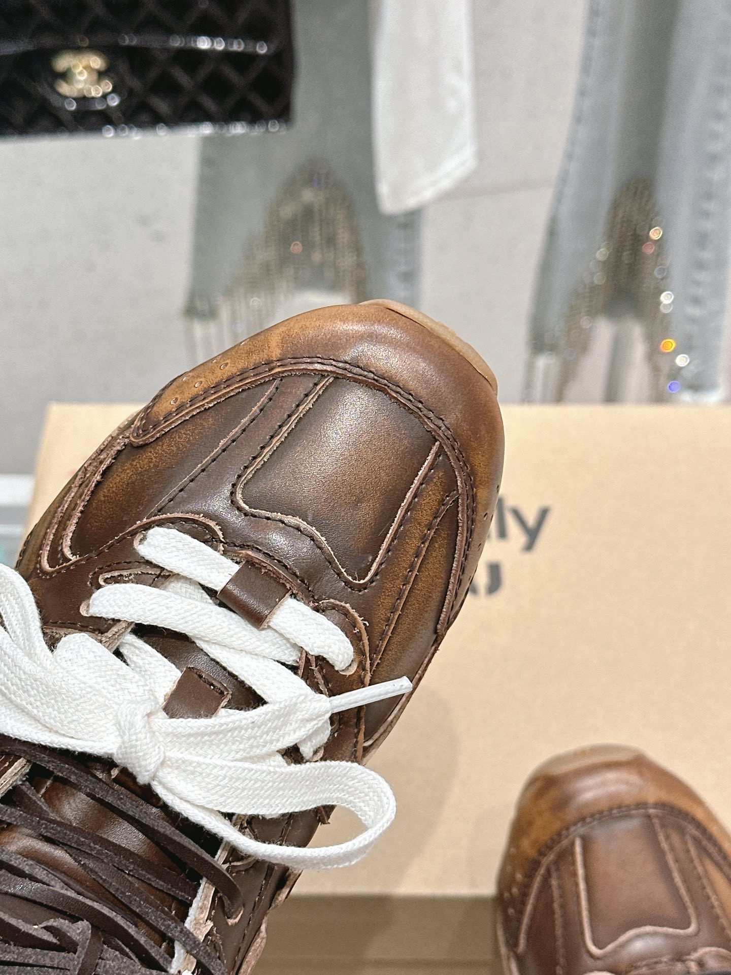 Кроссовки Miu Miu x New Balance коричневого цвета