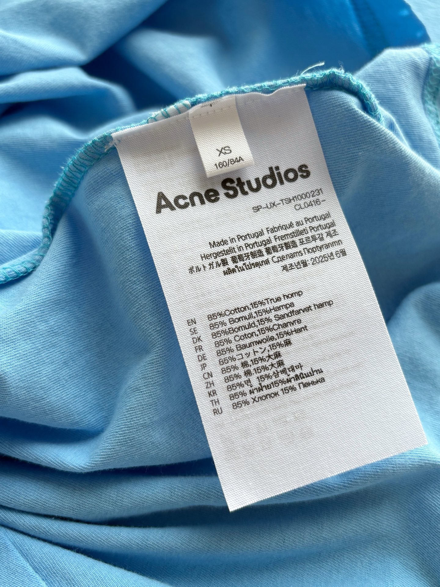 Лонгслив унисекс в стиле Acne Studios из хлопка и льна голубого цвета свободного кроя