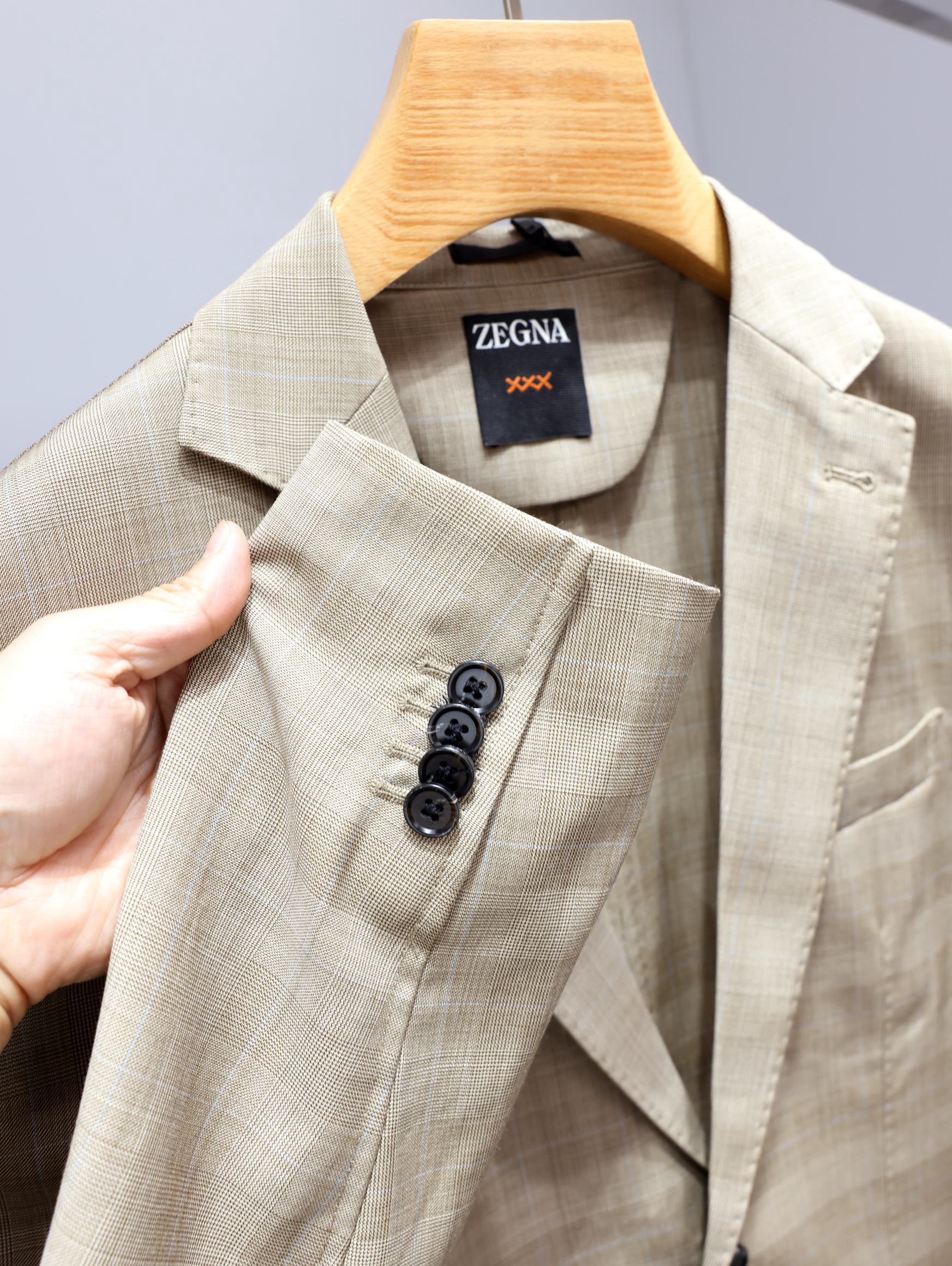 Пиджак мужской в стиле Zegna XXX Techmerino серо-бежевого цвета в клетку