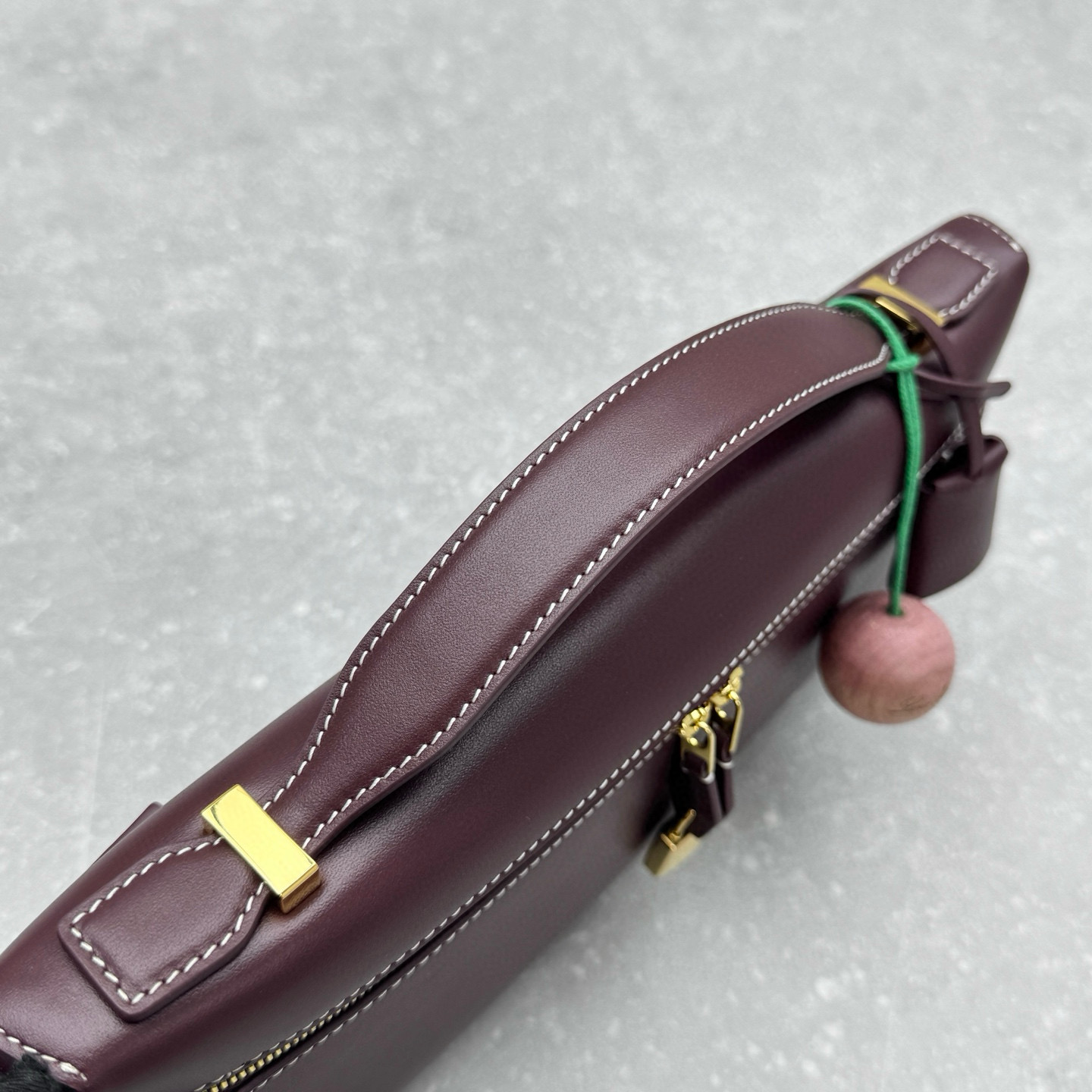Сумка- клатч женский в стиле Loro Piana Extra Clutch L29 из натуральной кожи тёмно-бордового цвета