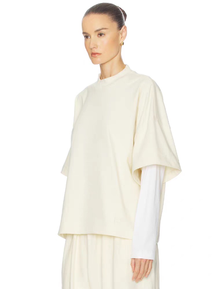 Брюки женские в стиле Toteme молочного цвета с вышивкой