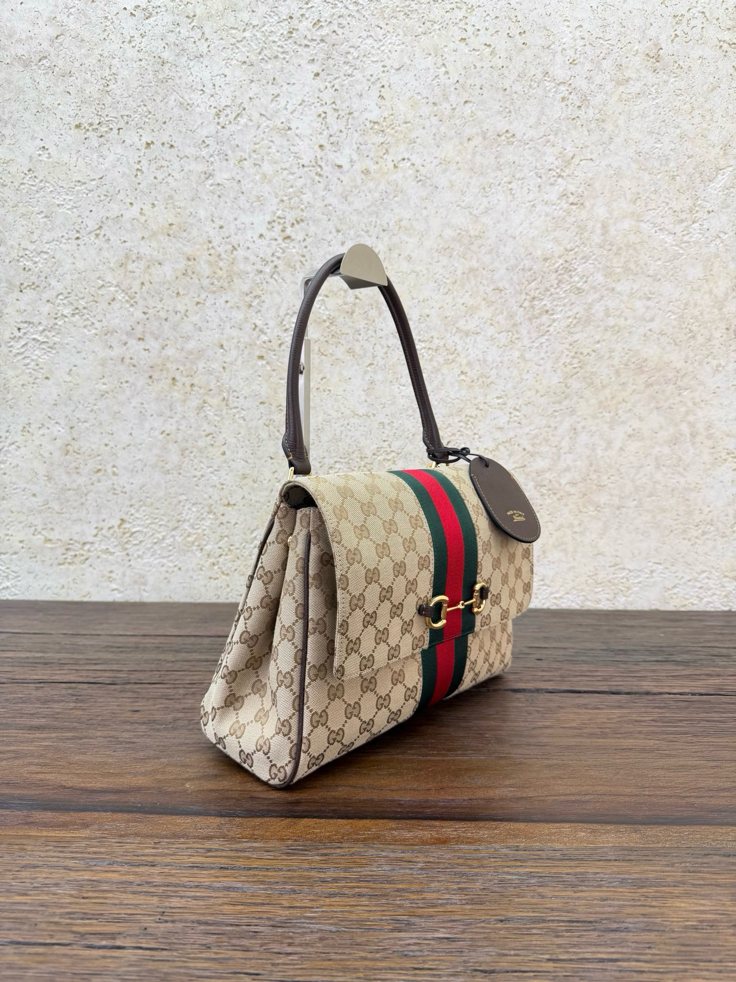 Сумка женская Gucci Paparazzo коричневого цвета