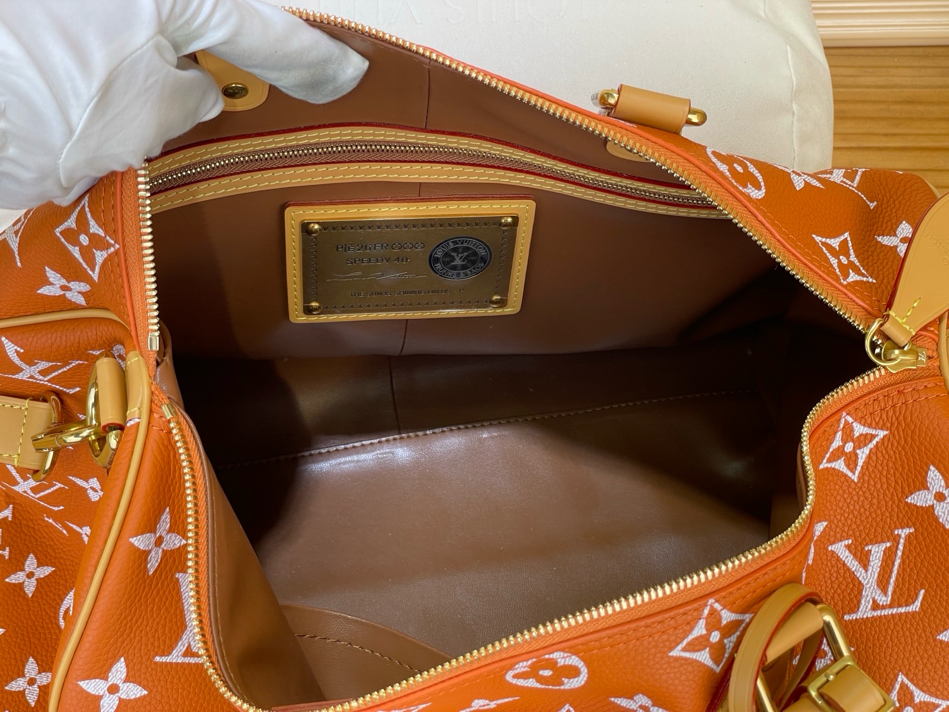 Сумка женская Louis Vuitton Speedy P9 Bandoulière 40 оранжевого цвета