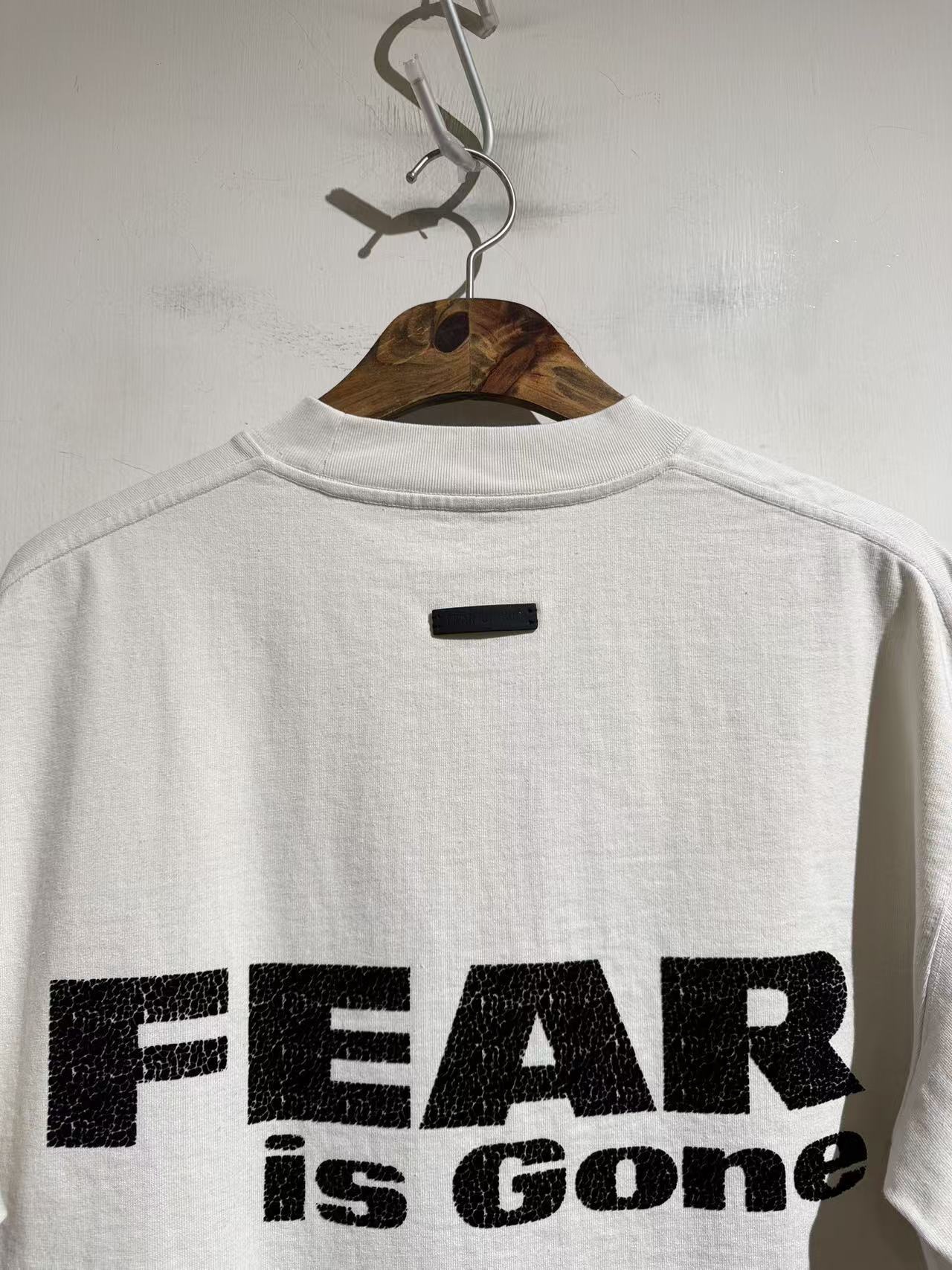 Футболка унисекс в стиле Fear of God Fear is Gone из хлопка белого цвета с принтом