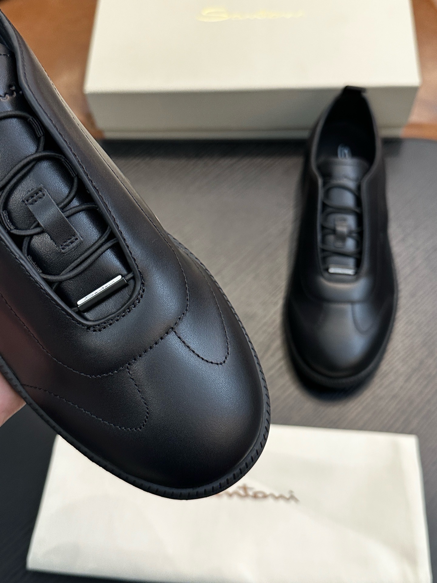 Кеды мужские в стиле Santoni из натуральной кожи черного цвета