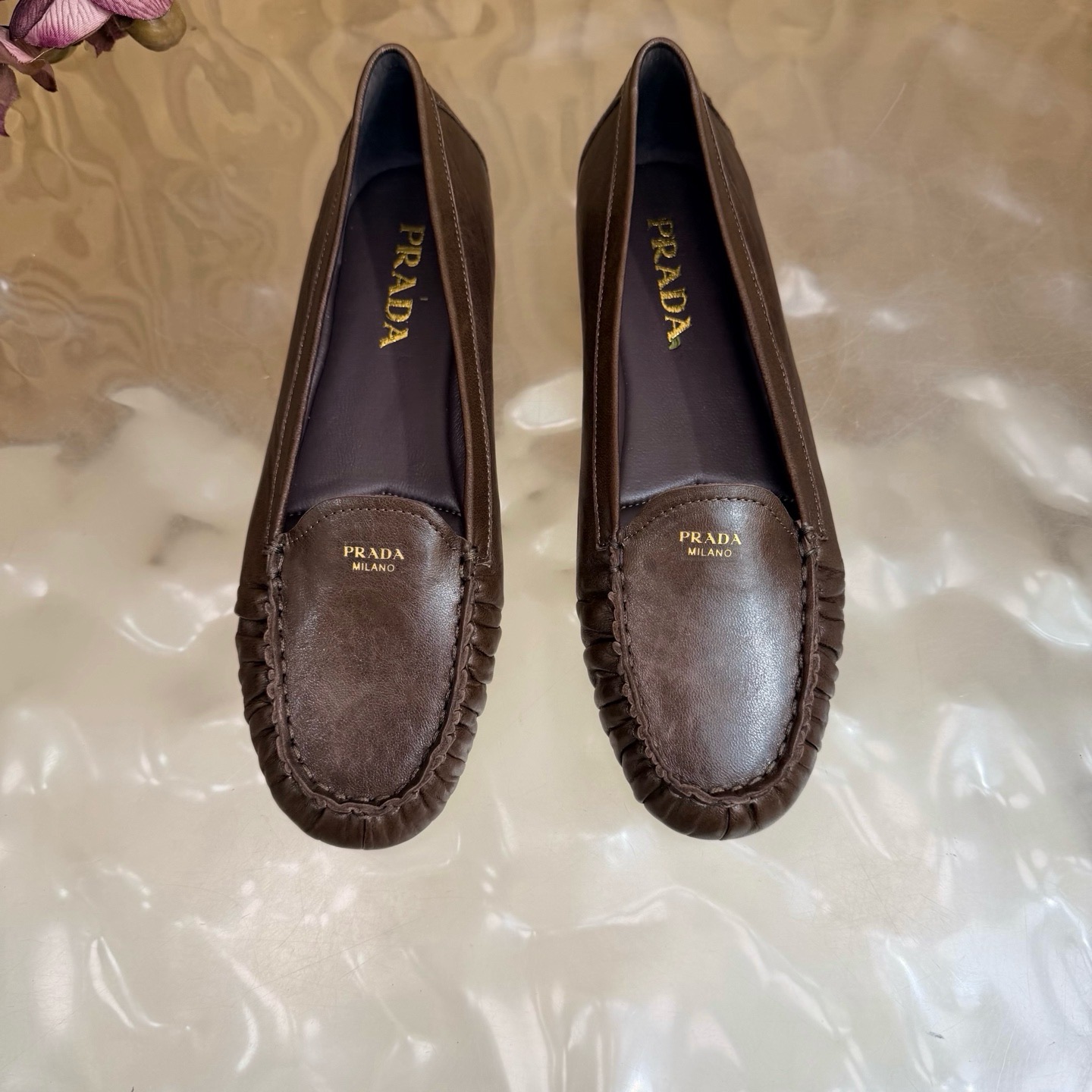 Лоферы женские Prada тёмно-коричневого цвета