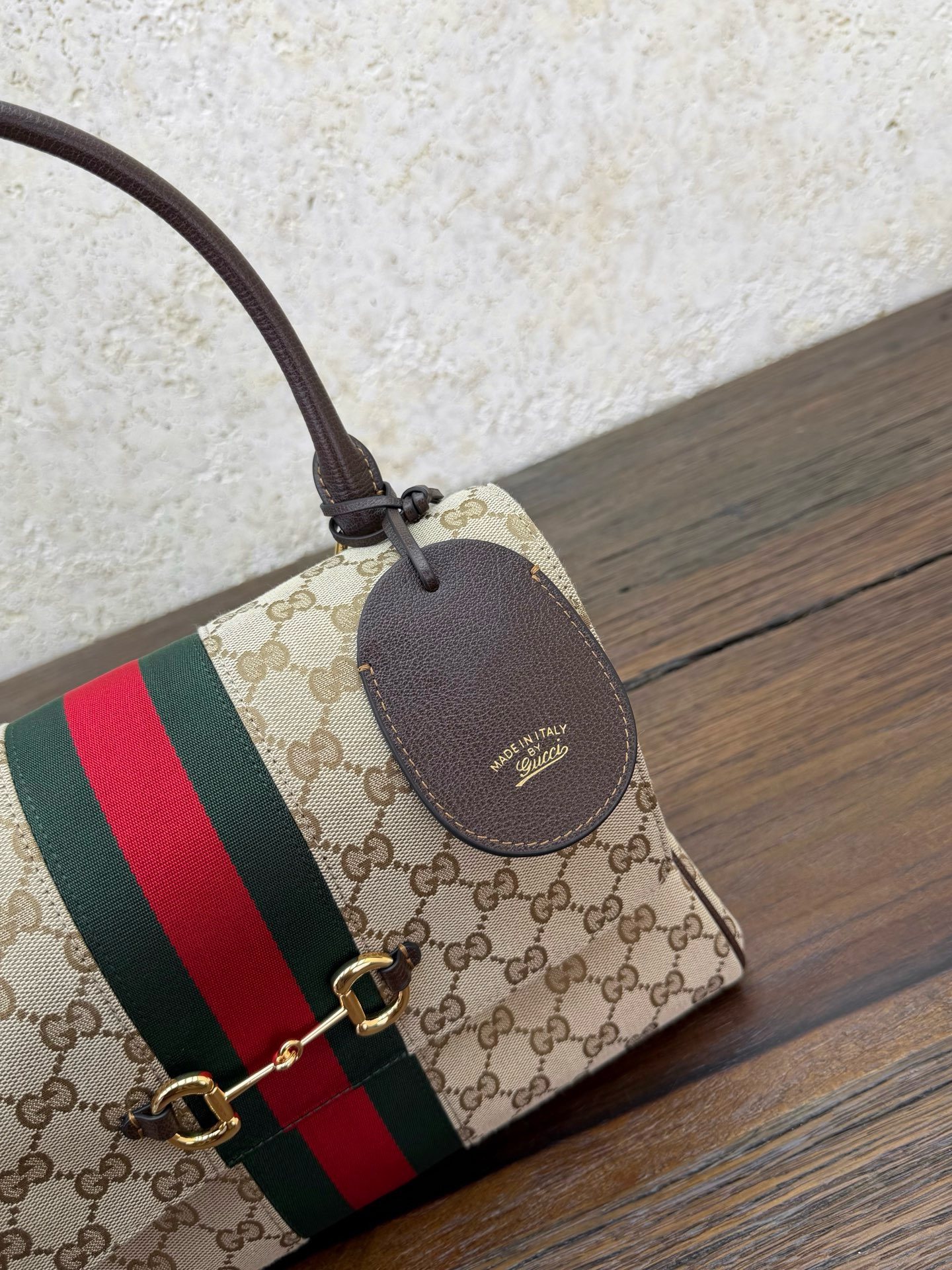 Сумка женская Gucci Paparazzo коричневого цвета