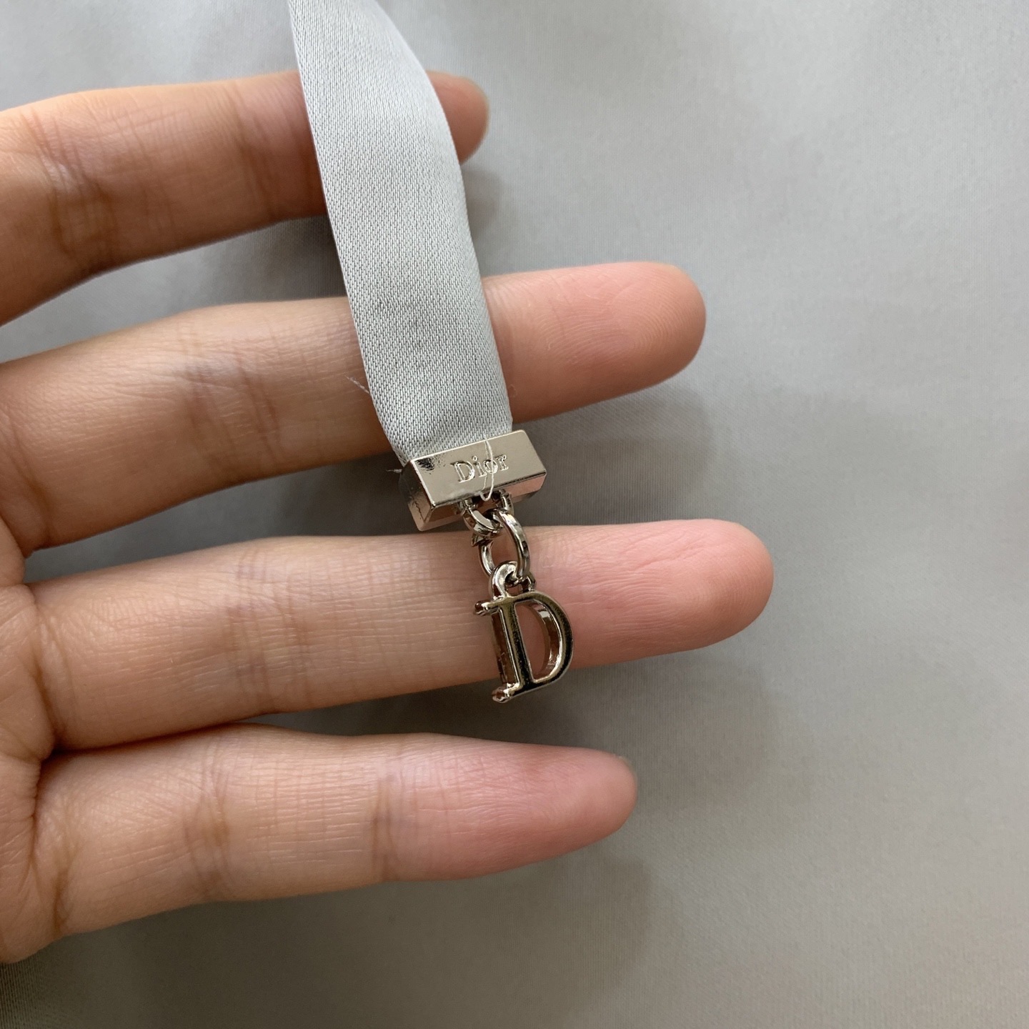 Костюм женский Dior серого цвета
