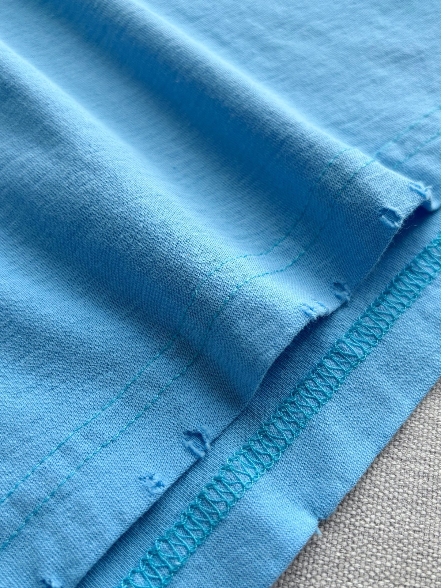 Лонгслив унисекс в стиле Acne Studios из хлопка и льна голубого цвета свободного кроя