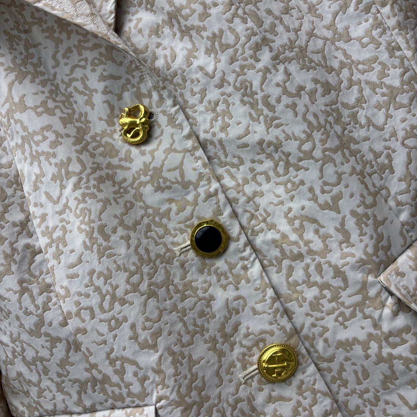 Костюм женский Schiaparelli с жакетом и мини-юбкой бежевого цвета