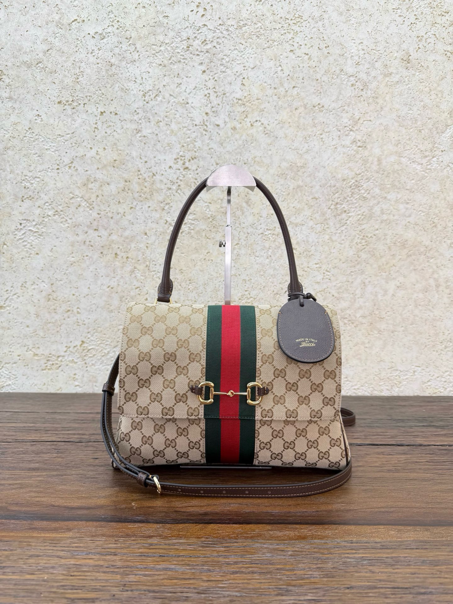 Сумка женская Gucci Paparazzo коричневого цвета