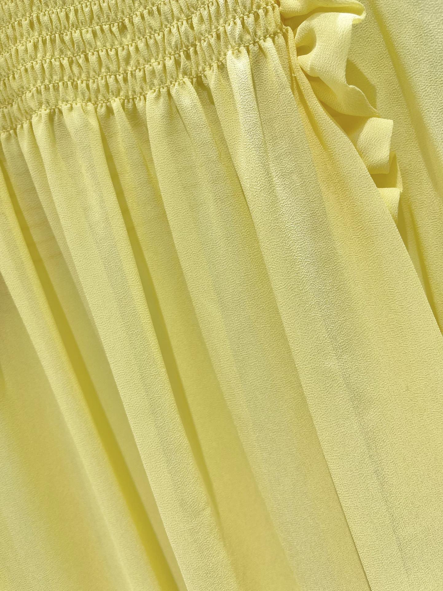 Блуза женская в стиле Saint Laurent жёлтого цвета с рюшами