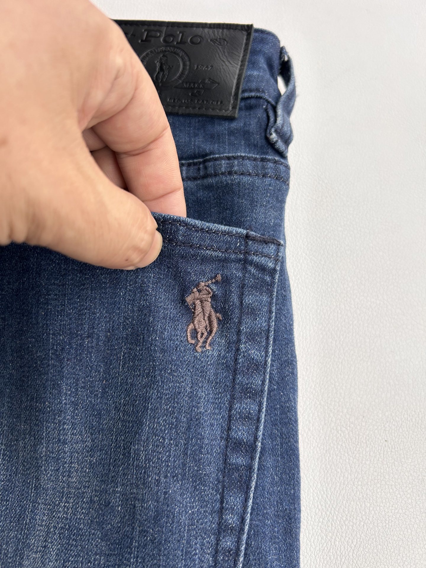 Джинсы мужские в стиле Ralph Lauren синего цвета зауженные с эффектом варки