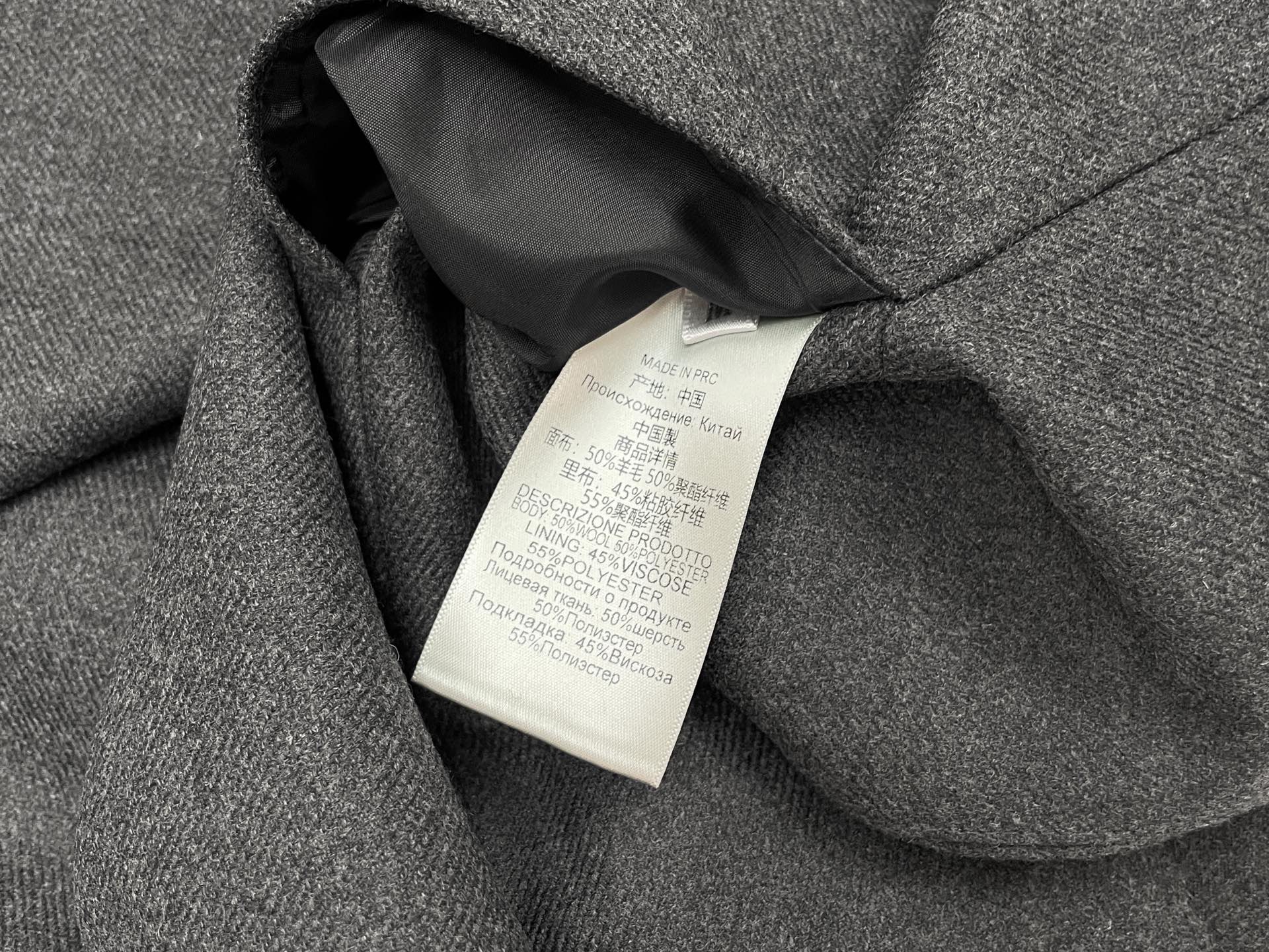 Пиджак женский в стиле Maison Margiela из шерсти серого цвета с минималистичным кроем