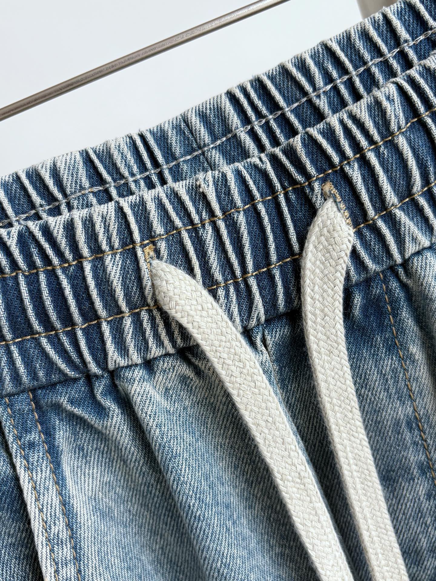 Джинсы мужские в стиле Bottega Veneta из денима синего цвета свободного кроя