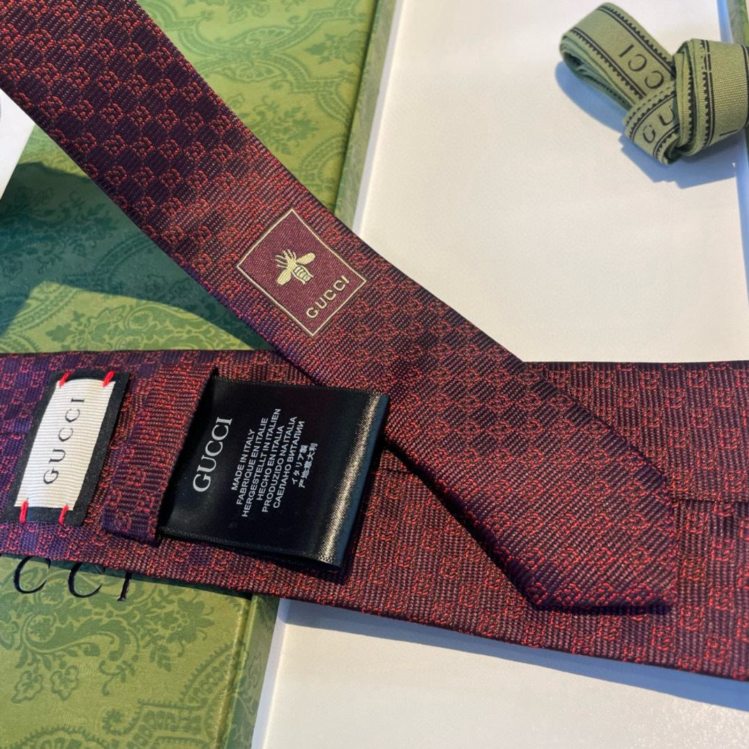 Галстук мужской в стиле Gucci из бордового цвета с жаккардовым узором GG