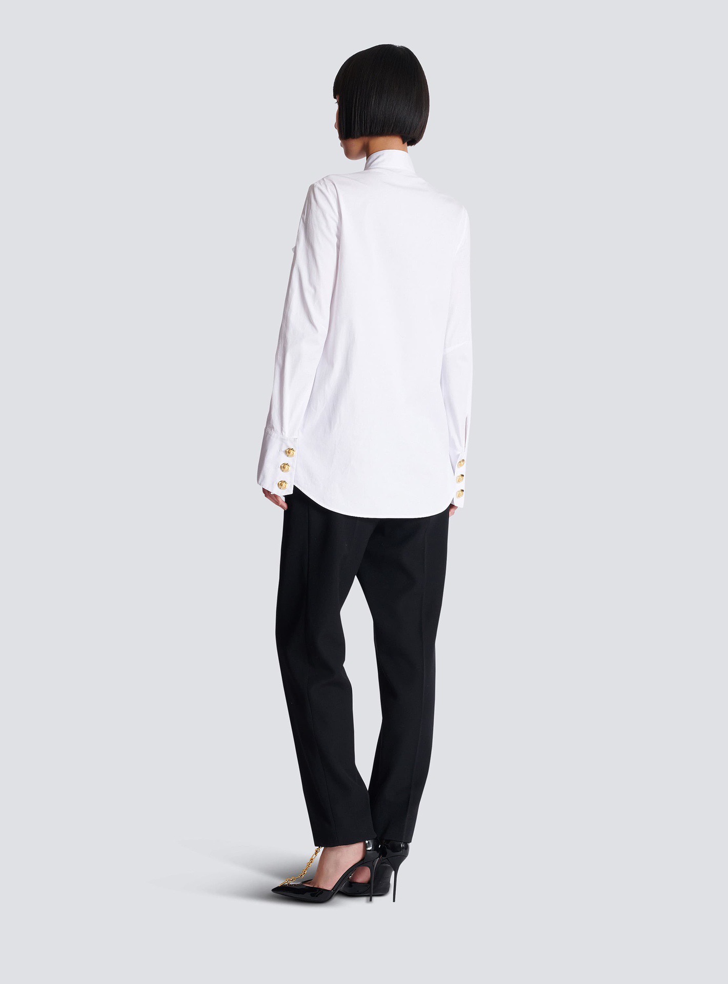 Блуза женская в стиле Balmain белого цвета с объёмными рюшами