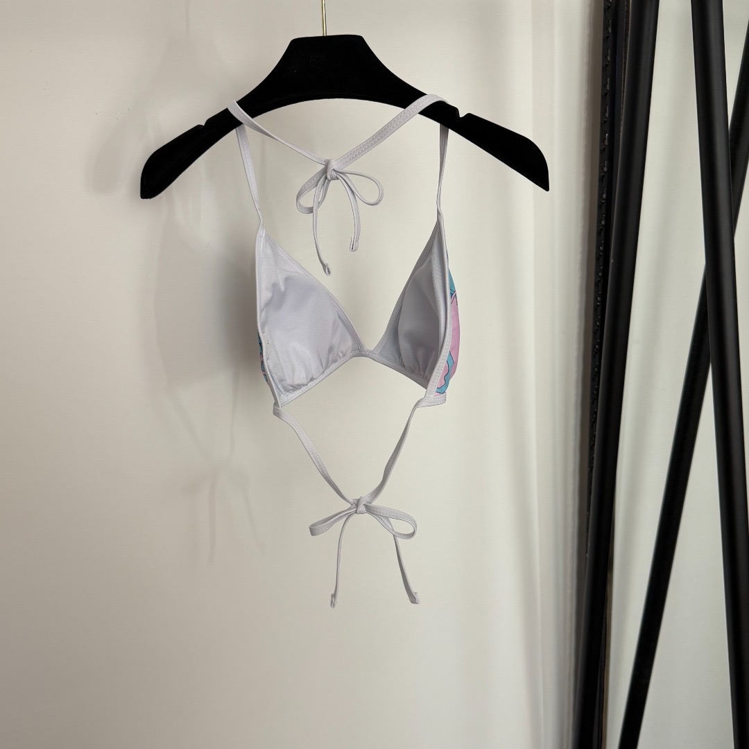 Купальник женский в стиле Emilio Pucci раздельный голубого цвета с принтом на завязках